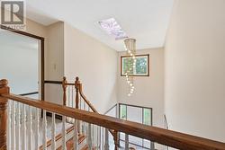 Two Storey Foyer Features a Decorative Skylight - 