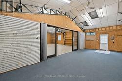 Moveable Glass Partition Wall in Accessory Bldg. - 