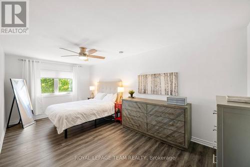 Primary Bedroom with HUGE walk-in closet - 212 Provender Avenue, Ottawa, ON - Indoor Photo Showing Bedroom