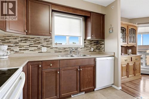 303 6709 Rochdale Boulevard, Regina, SK - Indoor Photo Showing Kitchen With Double Sink
