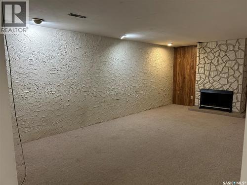 1145 9Th Avenue Sw, Moose Jaw, SK - Indoor Photo Showing Other Room With Fireplace