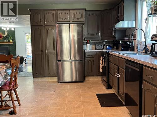 1145 9Th Avenue Sw, Moose Jaw, SK - Indoor Photo Showing Kitchen With Double Sink