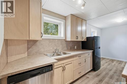 1318 B Avenue N, Saskatoon, SK - Indoor Photo Showing Kitchen With Double Sink