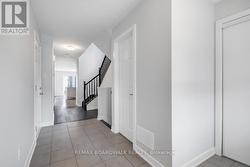 Front Foyer leading to family living space - 