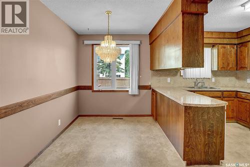 4 Groome Avenue, Regina, SK - Indoor Photo Showing Kitchen With Double Sink