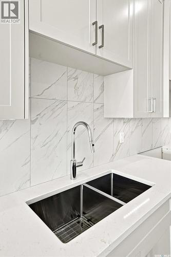 242 Doran Way, Saskatoon, SK - Indoor Photo Showing Kitchen With Double Sink