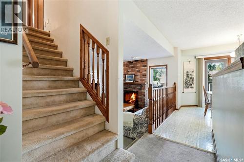 818 Spencer Lane, Saskatoon, SK - Indoor Photo Showing Other Room With Fireplace