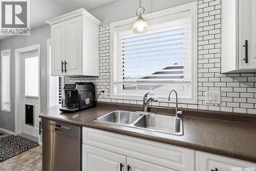 310 Martens Avenue, Warman, SK - Indoor Photo Showing Kitchen With Double Sink