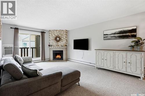 730 510 Prairie Avenue, Saskatoon, SK - Indoor Photo Showing Living Room With Fireplace