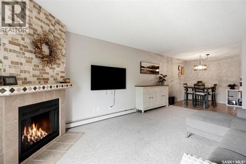 730 510 Prairie Avenue, Saskatoon, SK - Indoor Photo Showing Living Room With Fireplace