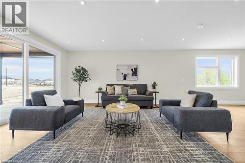 Photo from Cayuga Dedrick Model - Photo for illustration purposes only - 92 Craddock Boulevard, Jarvis, ON - Indoor Photo Showing Living Room