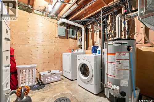 242 Candle Crescent, Saskatoon, SK - Indoor Photo Showing Laundry Room