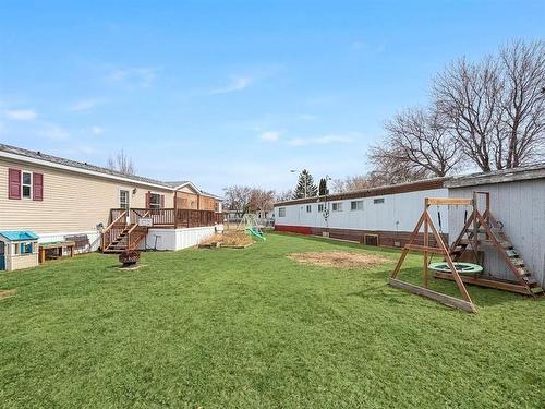 Corner Lot - 208 Madison Bay, Brandon, MB - Outdoor With Exterior