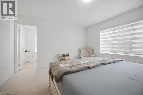 Carpeted interior room with white walls and ceiling - 240 Velvet Way, Niagara Falls, ON - Indoor Photo Showing Bedroom