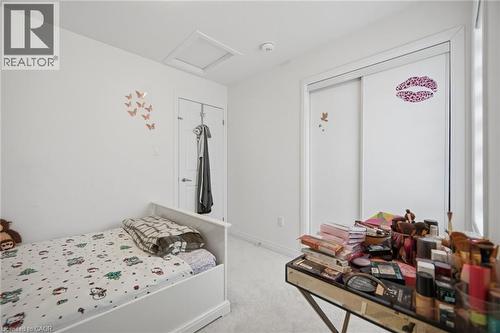 White wall finishes with light-colored carpeting - 240 Velvet Way, Niagara Falls, ON - Indoor Photo Showing Bedroom