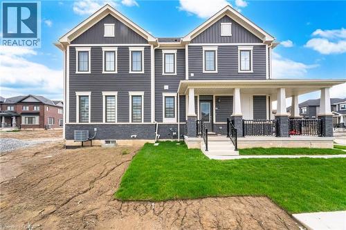 Modern multi-story facade featuring dark grey siding and white trim - 240 Velvet Way, Niagara Falls, ON - Outdoor With Deck Patio Veranda With Facade