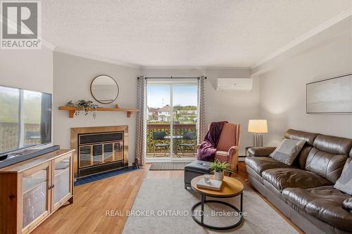 51 Haxby Private, Ottawa, ON - Indoor Photo Showing Living Room With Fireplace