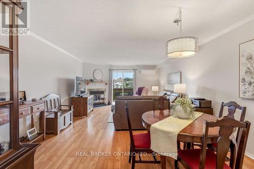 51 Haxby Private, Ottawa, ON - Indoor Photo Showing Dining Room With Fireplace
