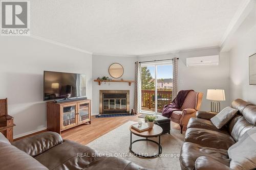 51 Haxby Private, Ottawa, ON - Indoor Photo Showing Living Room With Fireplace