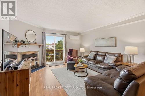 51 Haxby Private, Ottawa, ON - Indoor Photo Showing Living Room With Fireplace