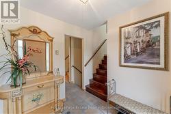 Foyer stairs lead to lvg, kitchen & basement - 