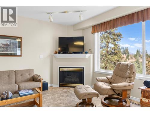 3849 Glen Canyon Drive, West Kelowna, BC - Indoor Photo Showing Living Room With Fireplace