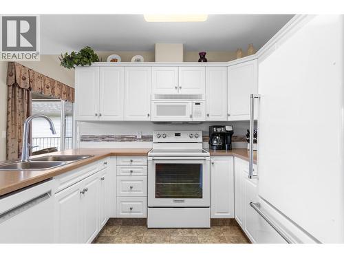 3849 Glen Canyon Drive, West Kelowna, BC - Indoor Photo Showing Kitchen With Double Sink