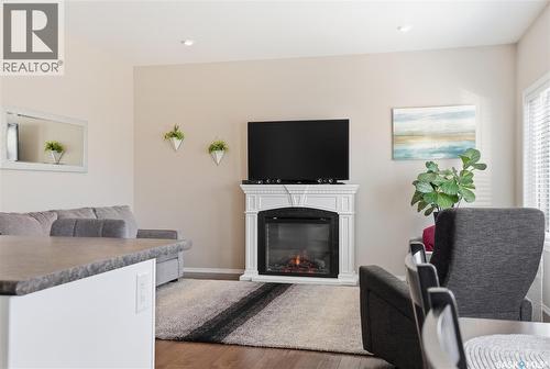 983 Pringle Cove, Saskatoon, SK - Indoor Photo Showing Living Room With Fireplace