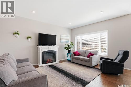 983 Pringle Cove, Saskatoon, SK - Indoor Photo Showing Living Room With Fireplace