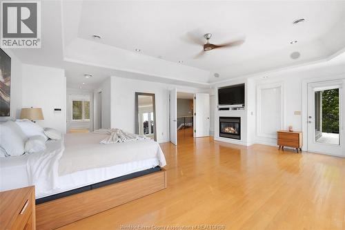 1740 Caille Avenue, Lakeshore, ON - Indoor Photo Showing Bedroom With Fireplace