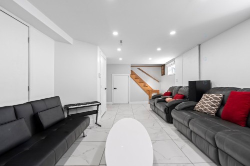 Salle familiale - 6705 Rue Rivière, Laval (Auteuil), QC - Indoor Photo Showing Other Room