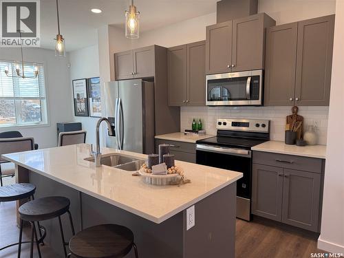 67 Taskamanwa Terrace, Saskatoon, SK - Indoor Photo Showing Kitchen With Double Sink With Upgraded Kitchen