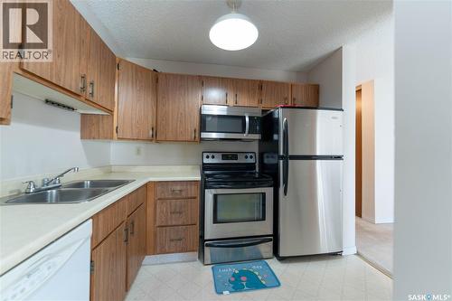 303 302 Tait Crescent, Saskatoon, SK - Indoor Photo Showing Kitchen With Stainless Steel Kitchen With Double Sink
