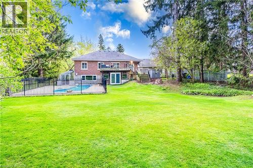 Backyard view to pool, patio and house - 3 Fallsview Road, Hamilton, ON - Outdoor With Backyard