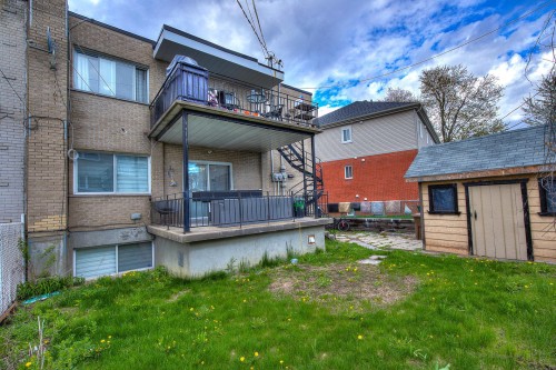 Back of Structure - 1273  - 1277 Rue Jasmin, Laval (Chomedey), QC - Outdoor With Deck Patio Veranda