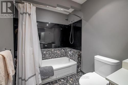 bathtub and shower combo - 720 Lake Street, St. Catharines (Lakeshore), ON - Indoor Photo Showing Bedroom