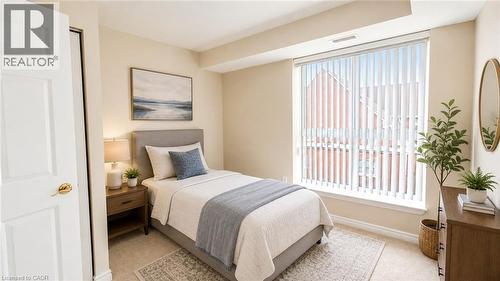 Vitually Staged - 20 St. George Street Unit# 404, Kitchener, ON - Indoor Photo Showing Bedroom