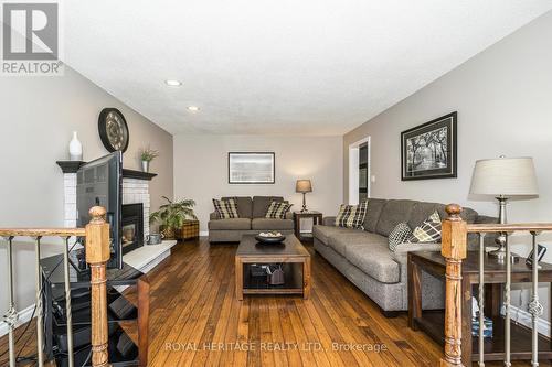 Breakfast looking to family room - 525 Sundown Crescent, Pickering, ON - Indoor Photo Showing Living Room With Fireplace