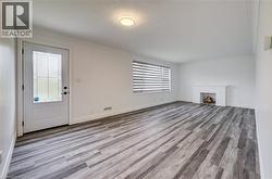 Living/Dining Room Combination w/ Decorative Fireplace - 