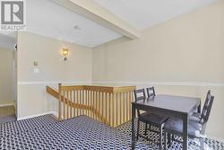 Area rug overtop of hardwood flooring - 