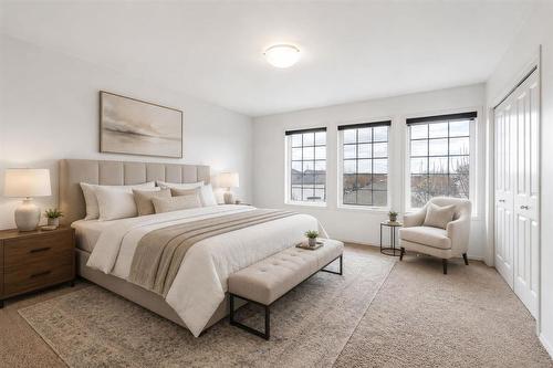 Virtually staged primary bedroom - 204 15 Bridgeland Drive, Winnipeg, MB 