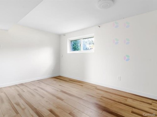 Living Room - 1010A Rue Ridgewood, Laval (Chomedey), QC - Indoor Photo Showing Other Room