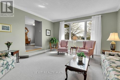 Large living room with a huge window. - 1340 Cuthbert Way, Ottawa, ON - Indoor Photo Showing Living Room