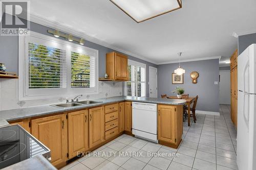 With plenty of of cupboard and counter space. - 1340 Cuthbert Way, Ottawa, ON - Indoor Photo Showing Kitchen With Double Sink