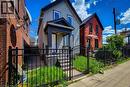 Light-colored siding exterior with dark trim accents - 334 Gage Avenue N, Hamilton, ON  - Outdoor 