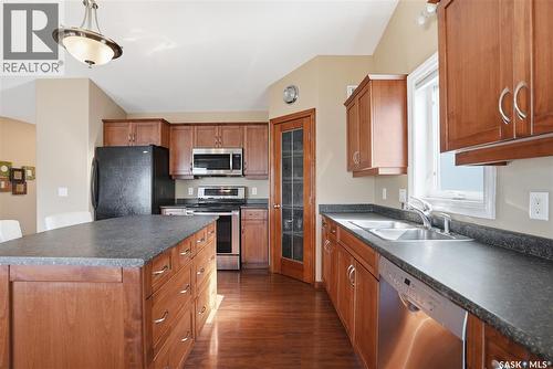 102 Keedwell Street, Saskatoon, SK - Indoor Photo Showing Kitchen With Double Sink