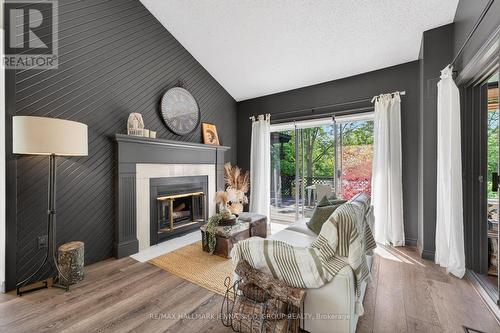 1214 Upton Road, Ottawa, ON - Indoor Photo Showing Living Room With Fireplace
