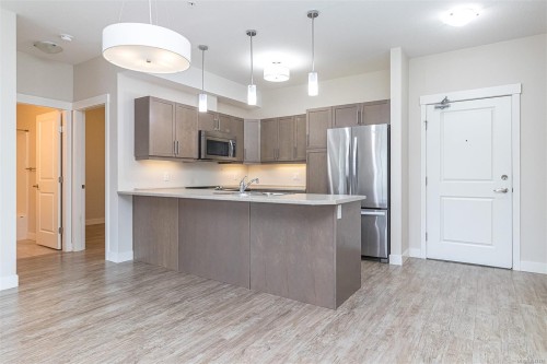 #302-1900 Tulsa Rd, Nanaimo, BC - Indoor Photo Showing Kitchen With Upgraded Kitchen