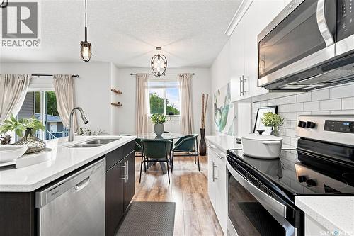 158 3220 11Th Street W, Saskatoon, SK - Indoor Photo Showing Kitchen With Double Sink With Upgraded Kitchen