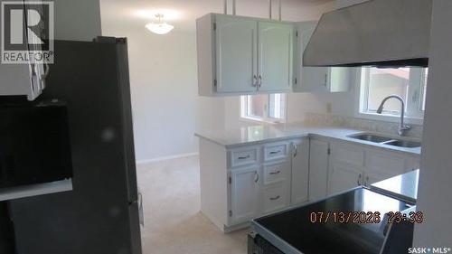 335 Wedge Road, Saskatoon, SK - Indoor Photo Showing Kitchen With Double Sink